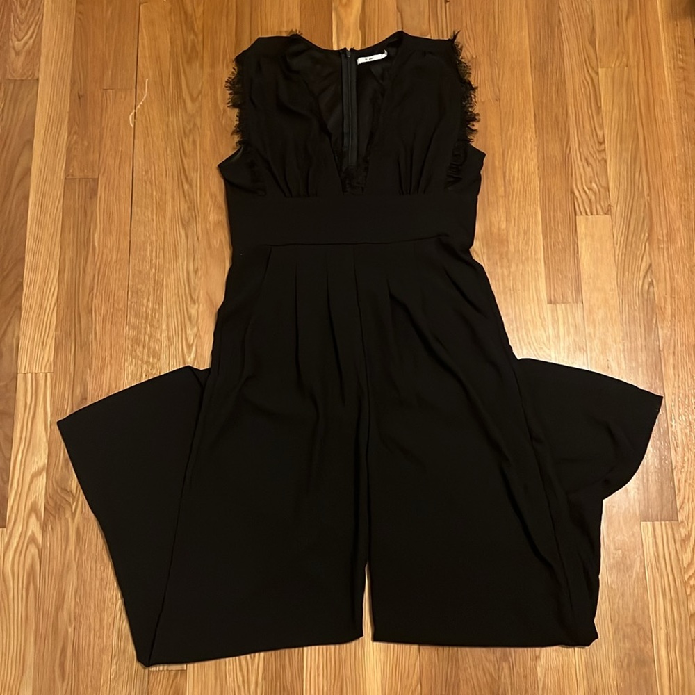 Black Sleeveless Jumpsuit with Frayed Trim
